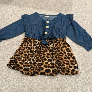 Adorable baby girl animal print dress with ruffle accent
